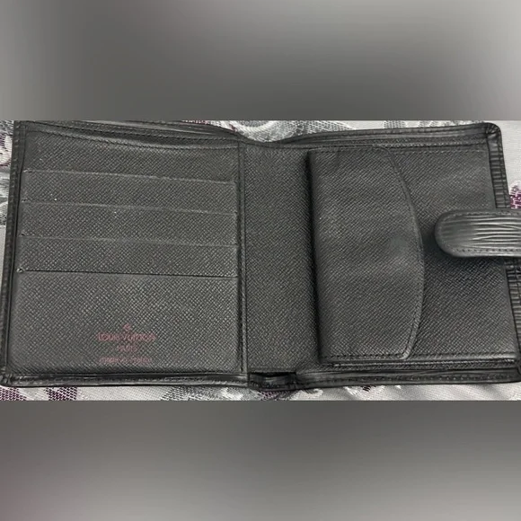 A very Loved Louis Vuitton bifold wallet